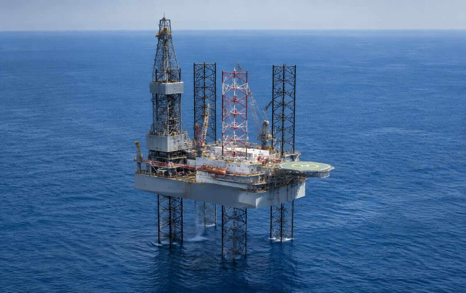 Jack-up offshore drilling rig in open sea, daytime